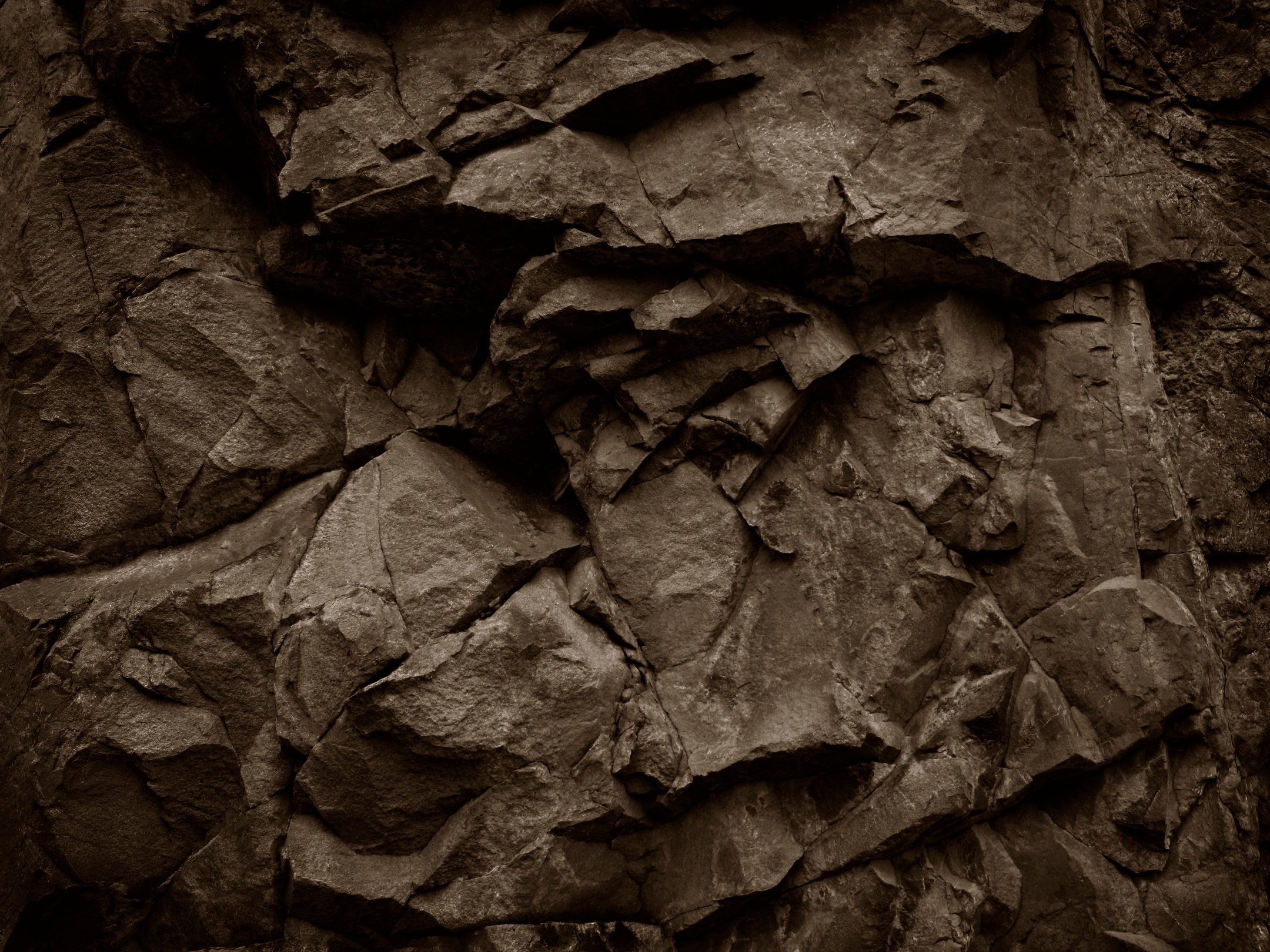 Brown stone background. Mountain close-up. Beautiful rock texture. Detail.